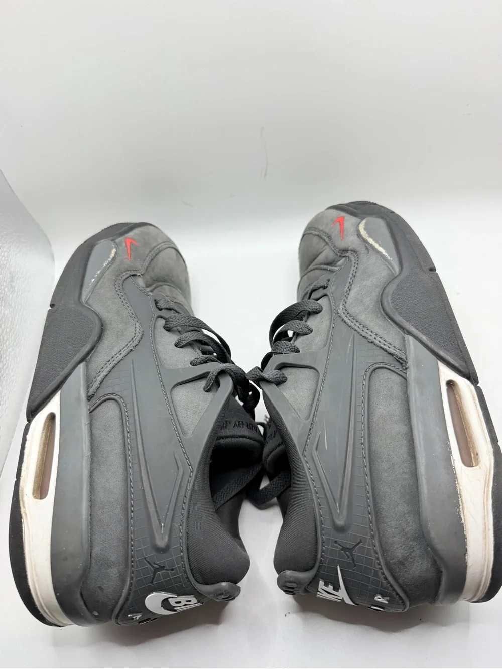 Jordan Kids Gray Sneakers with Red Swoosh